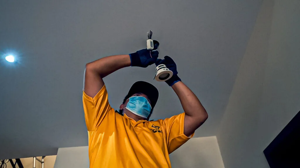Comprehensive Guide to Light Replacement and Installation Services in Dubai 2 Infiway staff working on Lighting replacemment and installation
